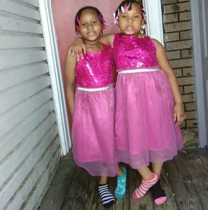 Two pink princess dresses